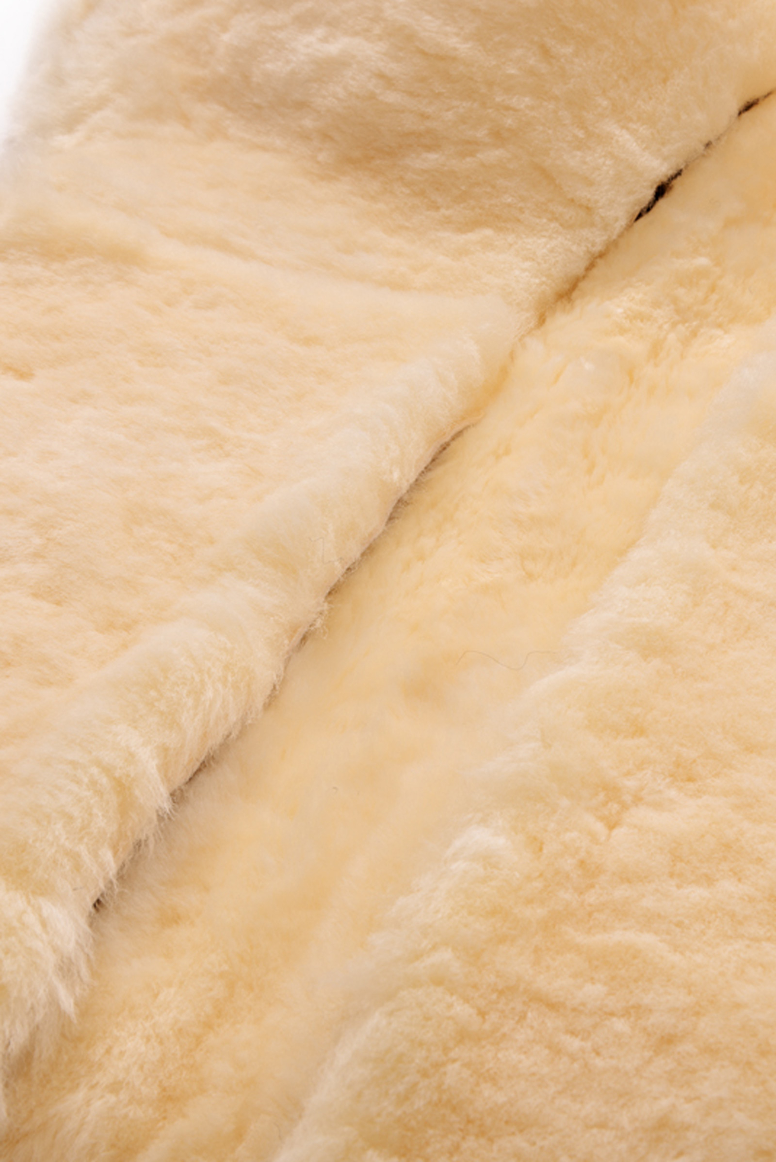 Kavalkade Lammull Sadelunderlag med Innvendige Lommer