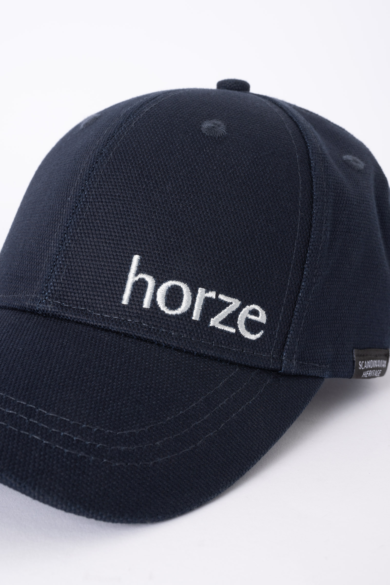 Horze caps med flagglogo